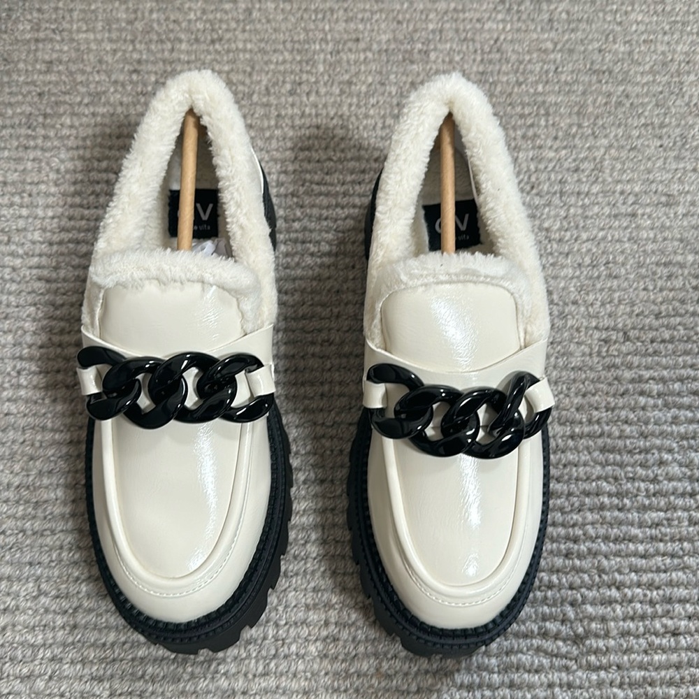 Dolce vita cream/black loafers. Super cute, looks like Chanel New several sizes